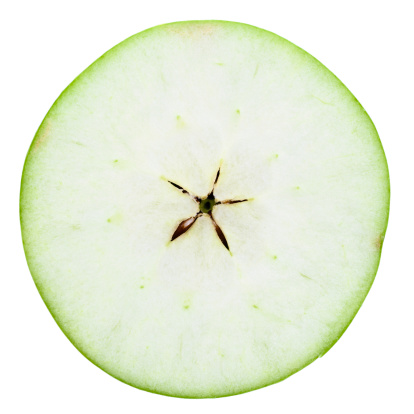 one half of green apple on white with extremity clipping paths