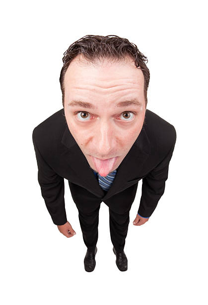 istock Business Man Sticking Tongue Out 186857859