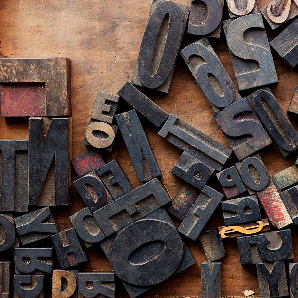 istock Letter Press Blocks against Wood 186858624