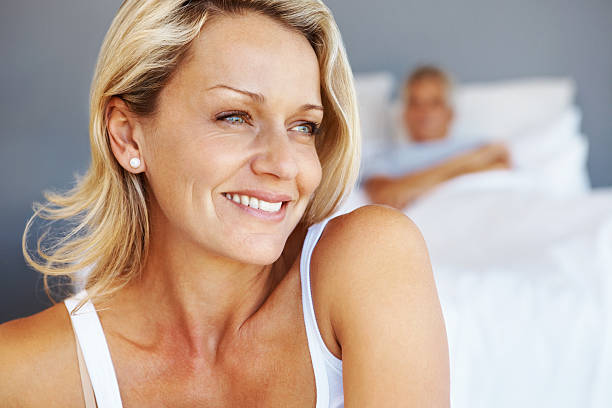istock Man with mature woman lost in happy thoughts 186858761