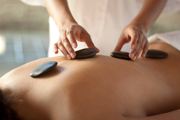 Hot stone massage stock photo