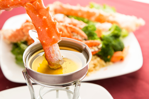A delicious meal of king crab and melted butter