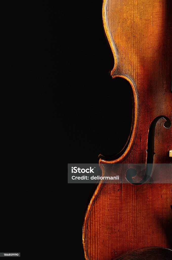 Old Violin on Black Background Antique Stock Photo