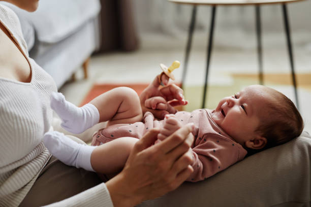 istock Joyful Baby Looking at Mom 1868599149