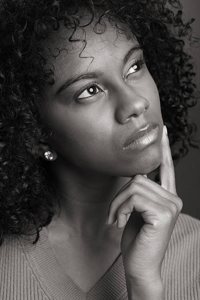 istock Young Woman Thinking 186860386