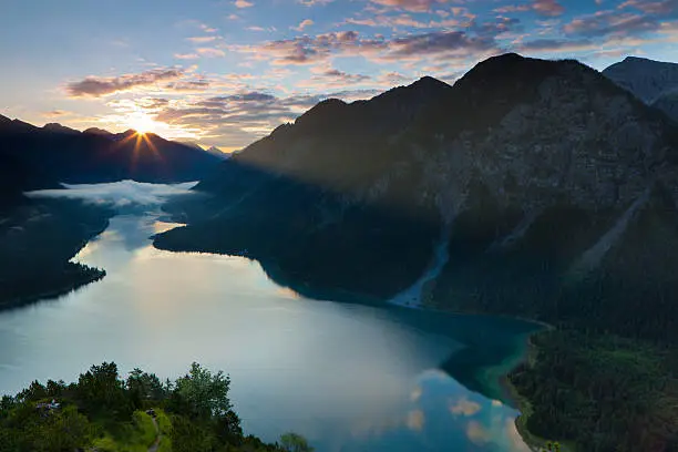 "top view on lake plansee with sunrise, tirol, austria, alpssonnenaufgang"