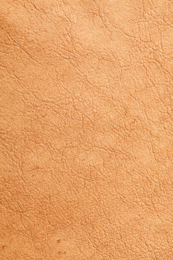 Soft and pliable piece of studio shot buckskin. This is not a flat scan. It was shot with a low camera angle to bring out its texture.