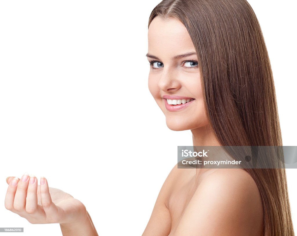 Mujer mostrando producto - Foto de stock de Adolescente libre de derechos