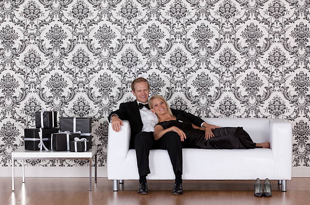 istock Happy couple on a couch 186862064