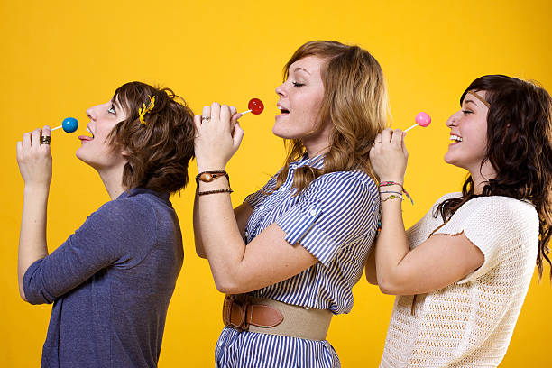 istock attractive young lollipop girls 186862139