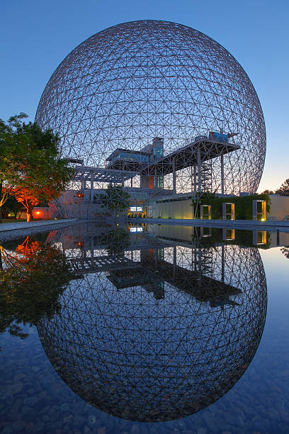 Mirrored Montreal Biosphere at Sunset  buzbuzzer montreal city stock pictures, royalty-free photos & images