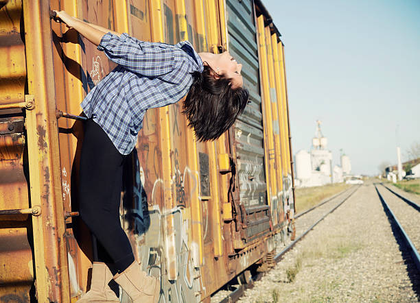 istock Young Adult Railroad Car Hanging 186862229
