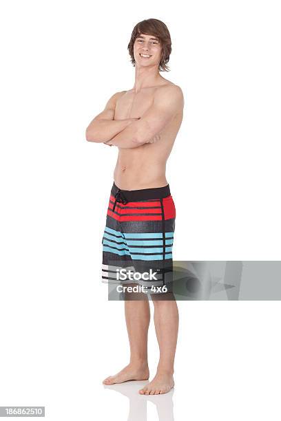 Männliche Stehen In Badeanzug Board Shorts Stockfoto und mehr Bilder von Badeshorts - Badeshorts, Männer, Nur Männer