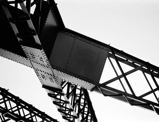 A close up of a bridge truss. B&W