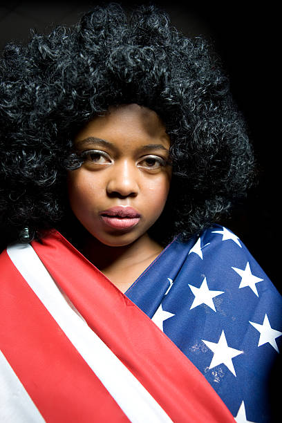 istock American Girl Wrapped In Flag 186862807