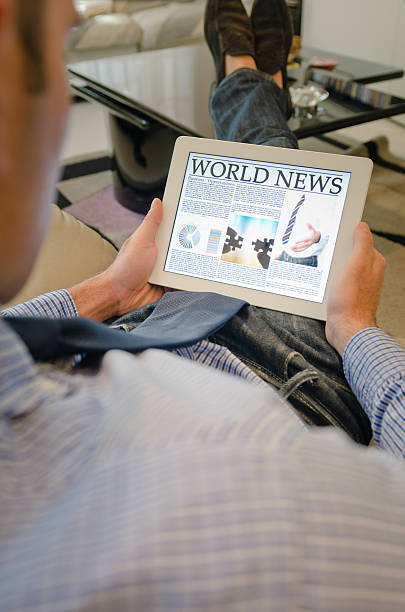 istock Reading a digital Newspaper on contemporary Tablet 186862863