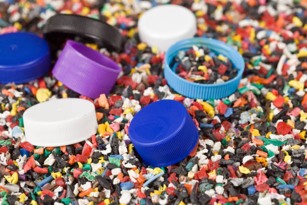 Close-up of a plastic bottle stopper and permanently attached cap