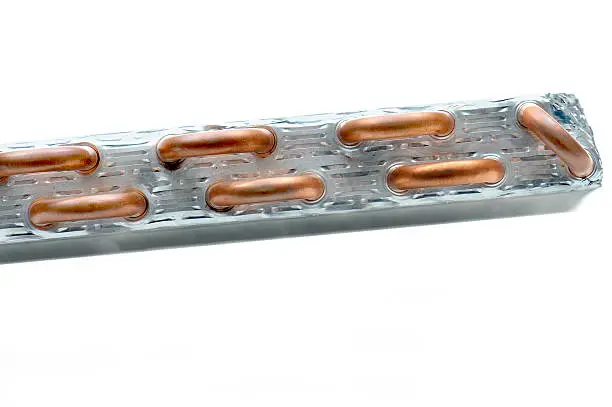 Copper tubing in an air conditioner coil.