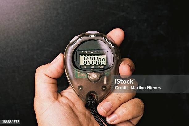 Stop Watch Stock Photo - Download Image Now - Stopwatch, Human Hand, Pursuit - Concept