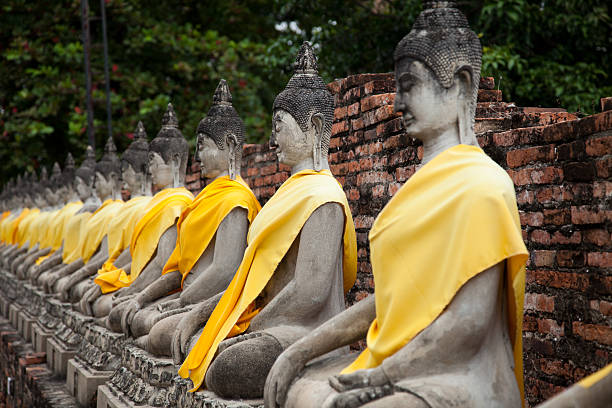 istock Sitting Buddhas images at Wat Yai Chai Mongkol, Ayutthaya, Thailand 186864704