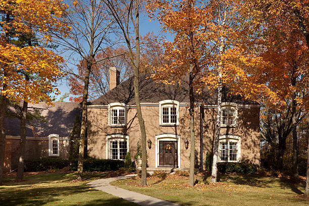 istock Mansion Home Nestled in Colorful Autumn Trees 186865943