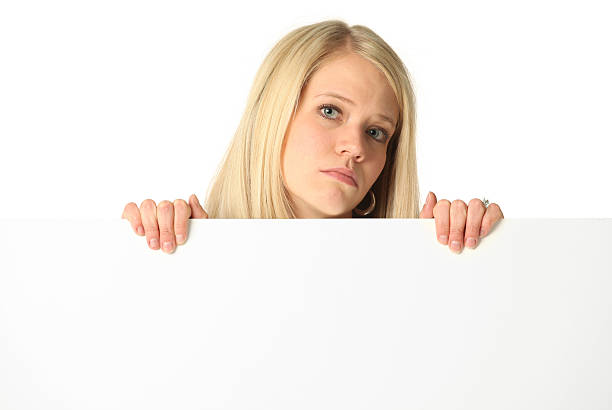 istock Businesswoman behind placard 186866219