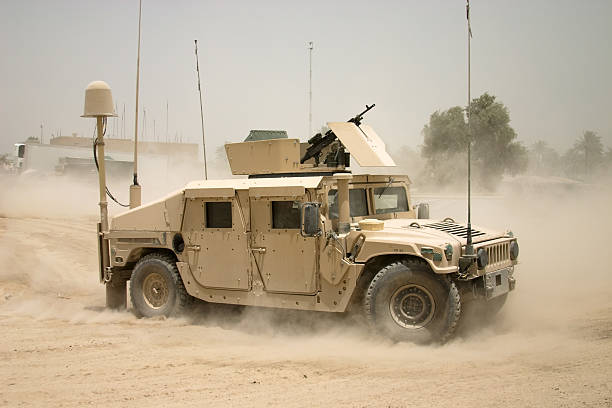 Moving Humvee View of Armored HMMWV in Iraq. armored vehicle photos stock pictures, royalty-free photos & images