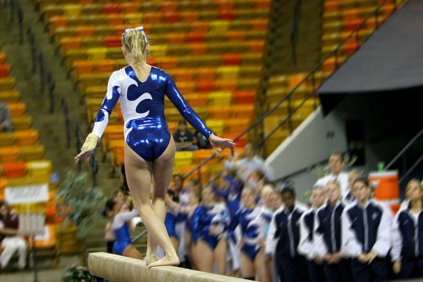 istock gymnastics balance beam blue leotard 186866782