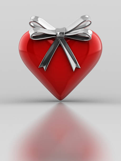 Red Metalic Heart with ribbon stock photo