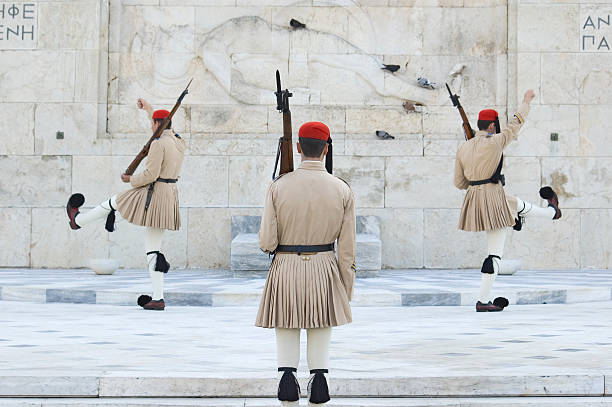 Changing of the Guard in Athens "The guards outside the Parliament building in Athens, Greece are changed." beckoning photos stock pictures, royalty-free photos & images