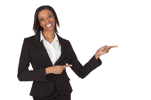 istock Happy businesswoman pointing sideways 186869265