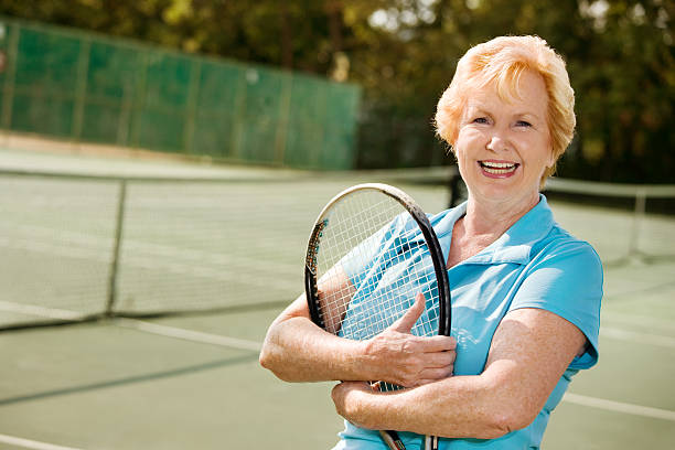 istock Active Senior woman tennis player 186869479