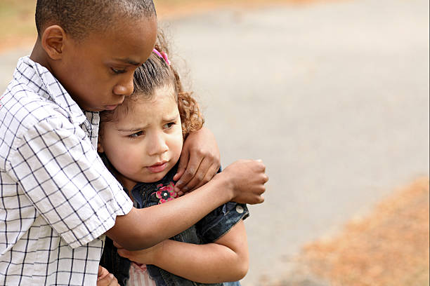 ochrona - african descent child brown eyes ethnicity zdjęcia i obrazy z banku zdjęć