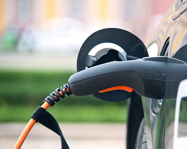 istock charge electric car site view close-up 186870146