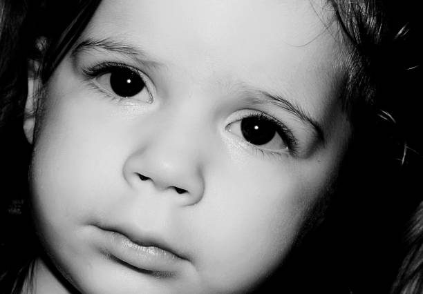 istock toddler in black and white 186870916
