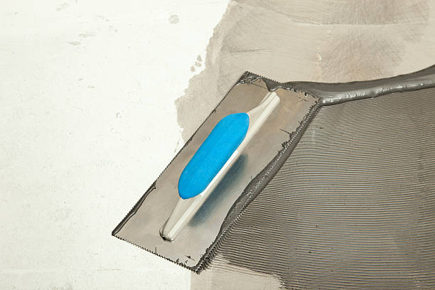 istock Adhesive Trowel for Recycled Rubber Floor 186871118