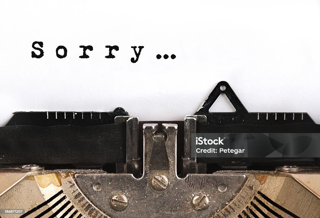 Desculpe de máquina de escrever - Foto de stock de Peço desculpa royalty-free