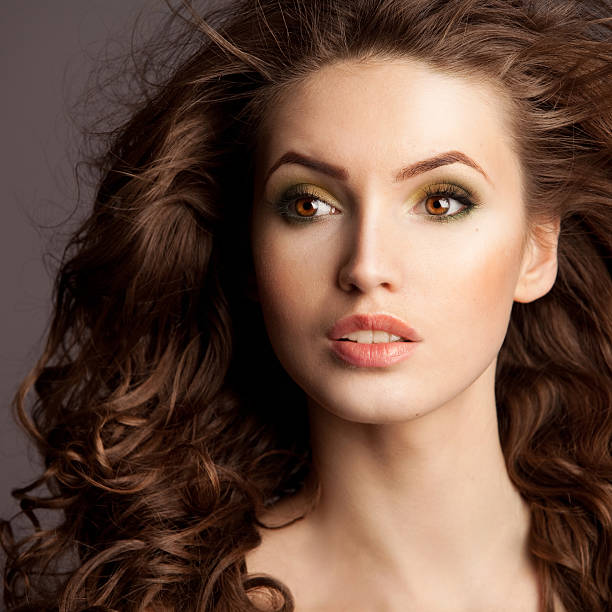 istock Beautiful woman with curls 186871220