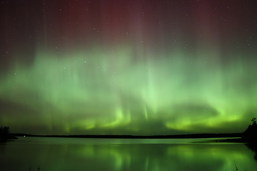 Aurora Borealis overlooking Nutimik lake,
Manitoba Canada