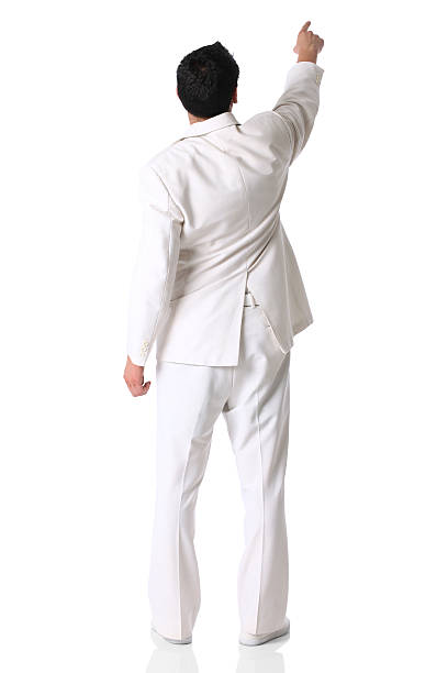 istock Rear view of a businessman pointing with finger 186872323