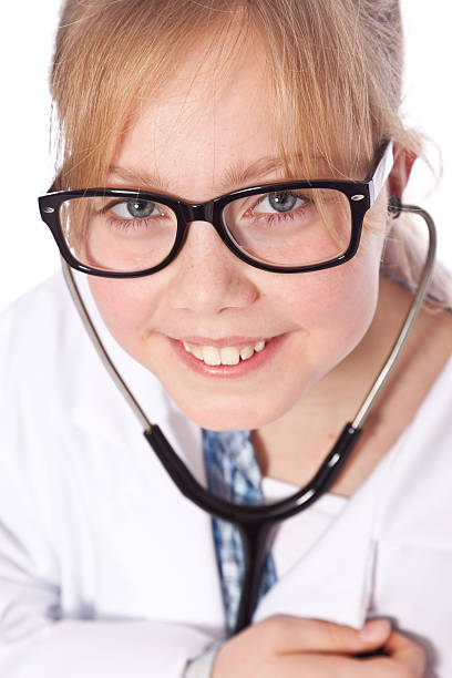 istock Young girl in doctors outfit 186872760