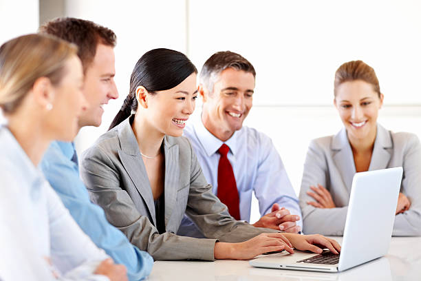 istock Business Team Working on a Laptop 186872823