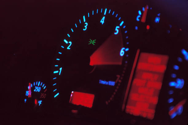 Redlining "Time-lapse, cross-processed exposure of a redlining tachometer.  For those curious, the tachometer is from an Audi A4.  Shot on C41 film cross processed as E6 with a Canon EOS SLR.  Very high quality." Revving stock pictures, royalty-free photos & images