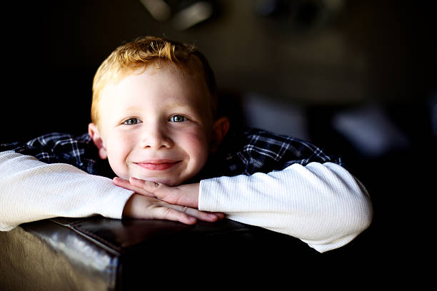 istock young male child natural light 186872982