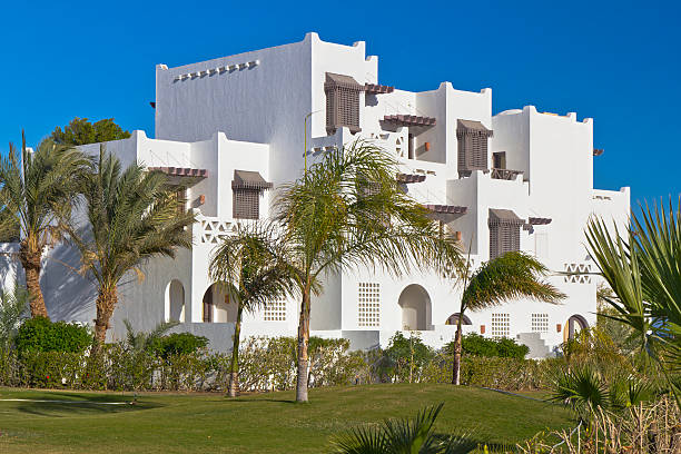 Remote white resort buildings near empty desert beach facing the Red Sea. High quality photo