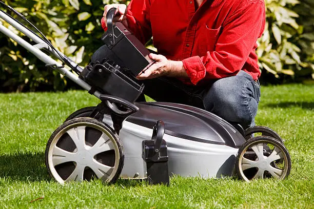 A battery powered lawnmower.