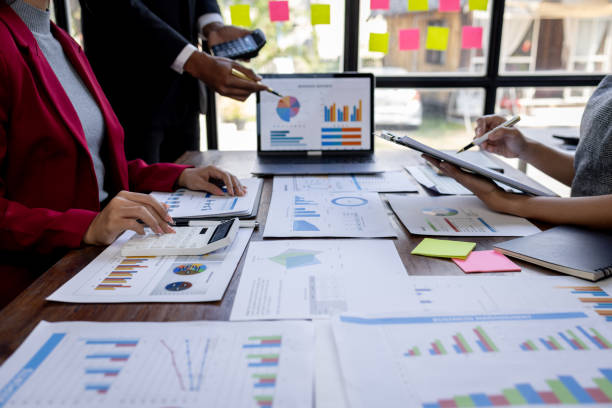 istock Team Of Business working at the office with documents on desk, planning analyzing the financial report, business plan investment, Consultant, finance analysis concept 1868740443