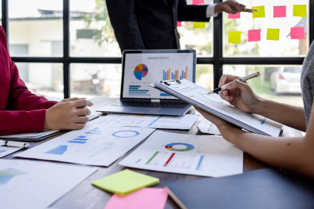 istock Team Of Business working at the office with documents on desk, planning analyzing the financial report, business plan investment, Consultant, finance analysis concept 1868740445