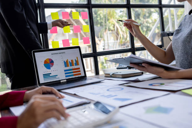 istock Team Of Business working at the office with documents on desk, planning analyzing the financial report, business plan investment, Consultant, finance analysis concept 1868740447