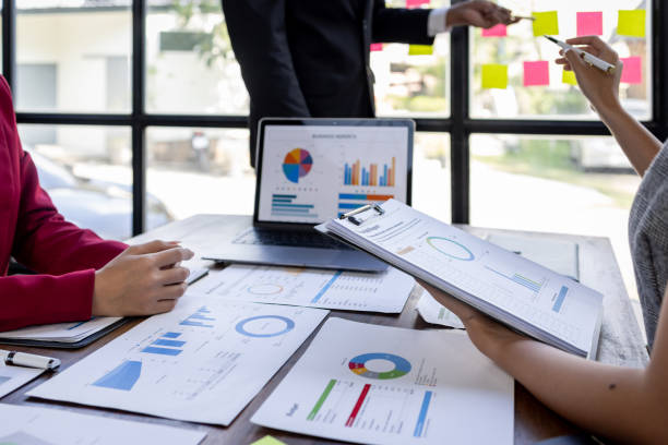 istock Team Of Business working at the office with documents on desk, planning analyzing the financial report, business plan investment, Consultant, finance analysis concept 1868740482